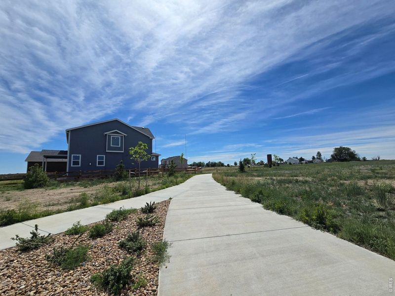 Front exterior of a new home in Hidden Creek, Frederick, CO, highlighting curb appeal (Image 17).
