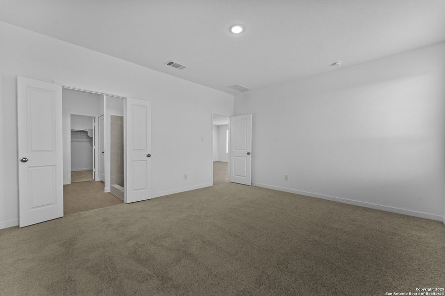 Spacious, unfurnished interior of a new home in Waterwheel: Coastline Collection, San Antonio (Image 24).