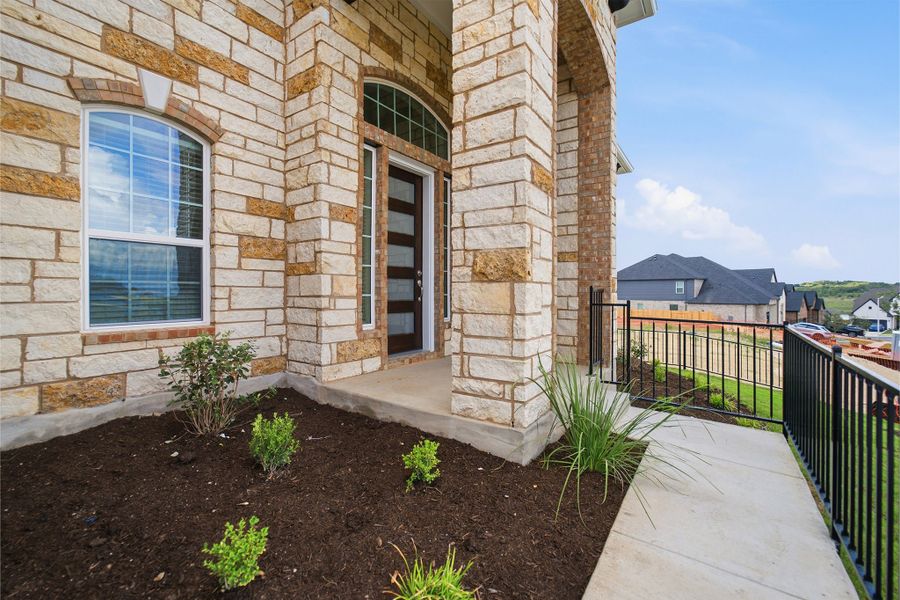 Exterior details and patio area of a home in Sunfield, Buda (Image 3). Exterior details and patio area of a home in Sunfield, Buda (Image 3).