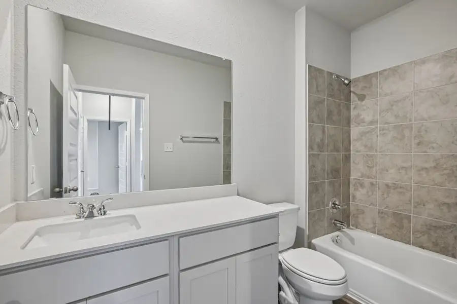 Furnished interior view inside a new home in Cloverleaf, Austin (Image 11).