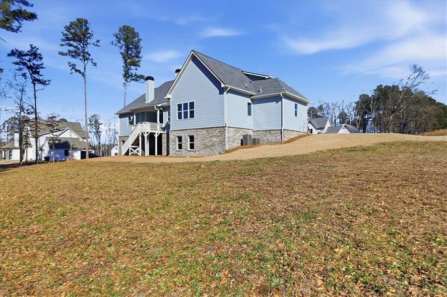 Exterior details and patio area of a home in Old Town Estates, Dacula (Image 32).