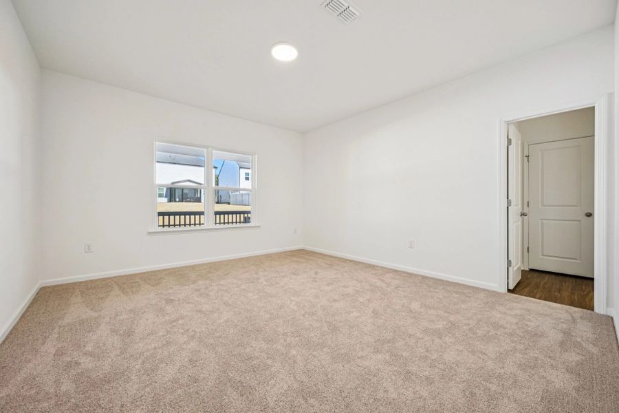 Primary Bed - A sophisticated retreat with style.