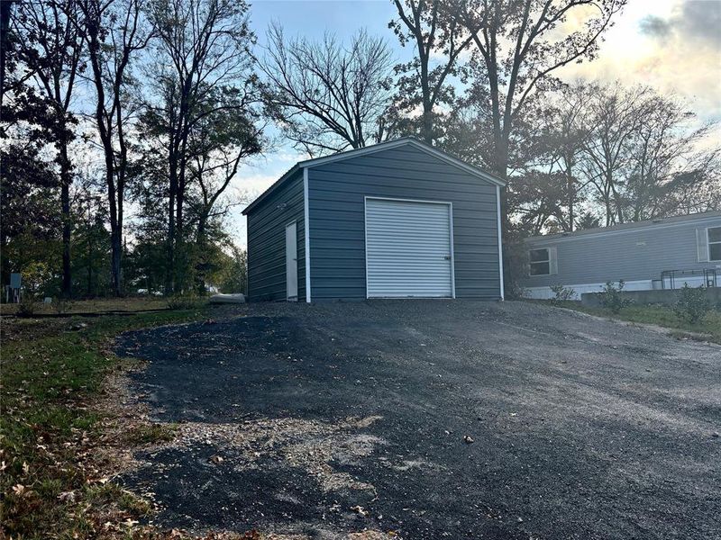 Detached garage with driveway