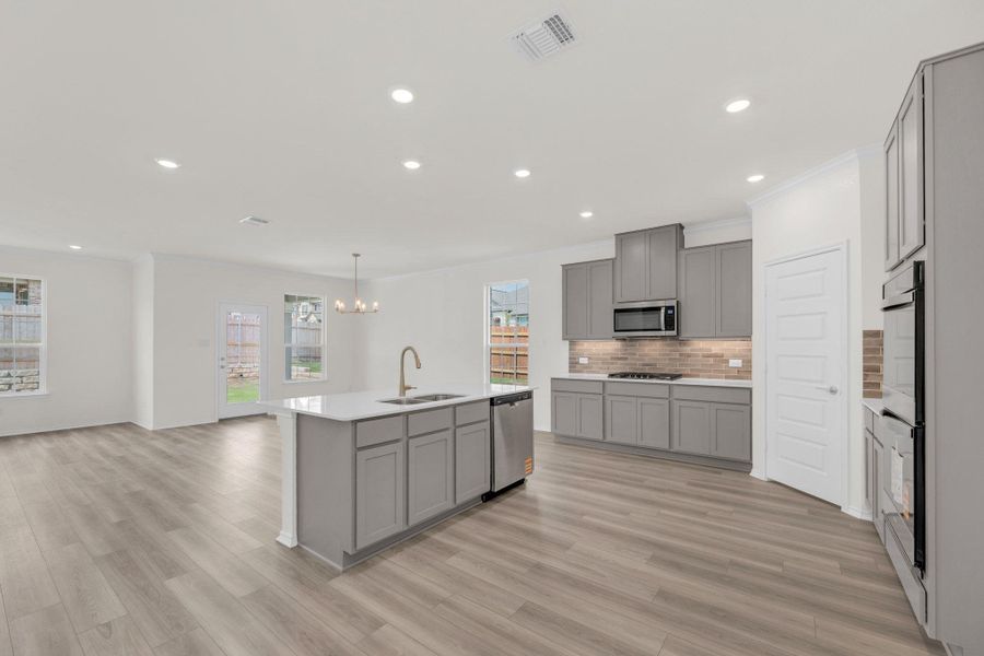 Furnished interior view inside a new home in Salerno - Classic Collection, Round Rock (Image 16). Furnished interior view inside a new home in Salerno - Classic Collection, Round Rock (Image 16).