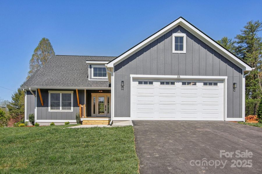 Front exterior of a new home in , Hendersonville, NC, highlighting curb appeal (Image 16).