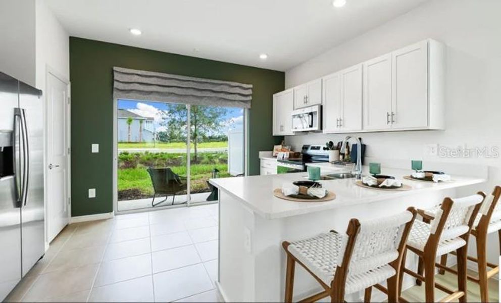 Furnished interior view inside a new home in Firethorn, Parrish (Image 10).