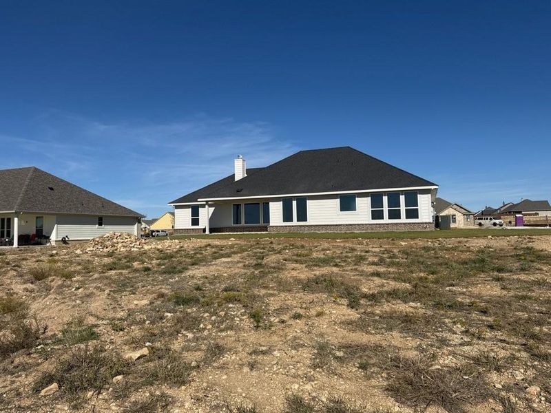 Exterior details and patio area of a home in Fairview Meadows, New Fairview (Image 4).