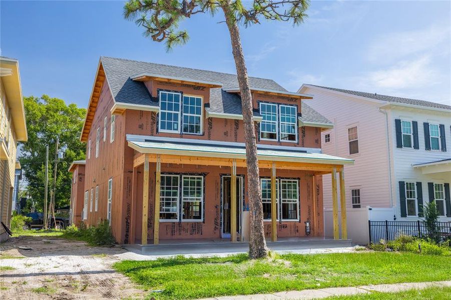 Front exterior of a new home in , St. Petersburg, FL, highlighting curb appeal (Image 5).