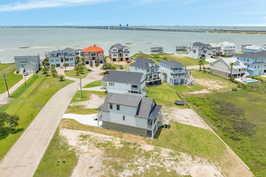 Front exterior of a new home in , Galveston, TX, highlighting curb appeal (Image 22).