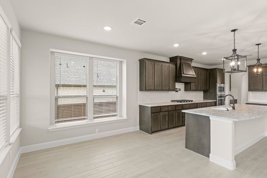 Furnished interior view inside a new home in Lovers Landing, Forney (Image 8).