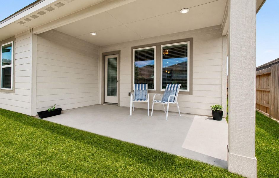 Relax after a long day under the covered back patio. Relax after a long day under the covered back patio.