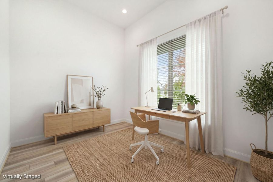 This home office could be used as a playroom, a workout room, or a craft room if a home office is not needed.