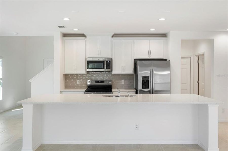 Furnished interior view inside a new home in Preservation Pointe, Davenport (Image 5). Furnished interior view inside a new home in Preservation Pointe, Davenport (Image 5).