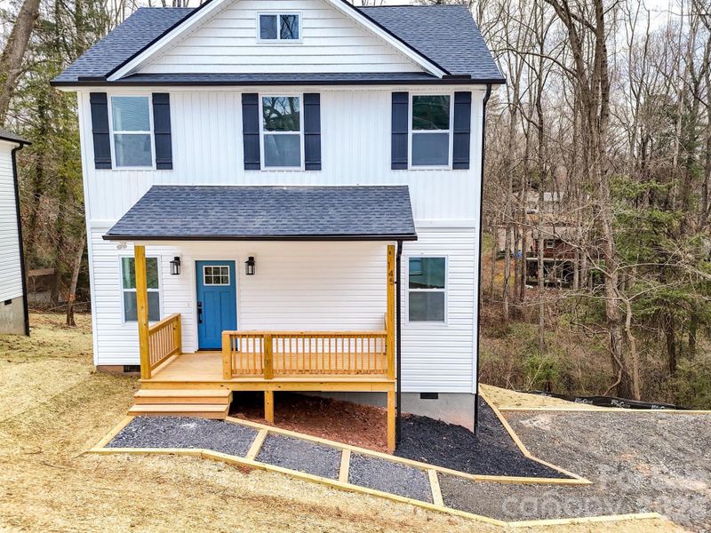 Exterior details and patio area of a home in , Asheville (Image 26).