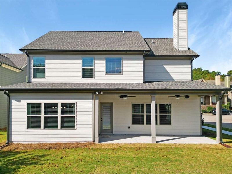 Exterior details and patio area of a home in Ridge Pointe, Athens (Image 2).