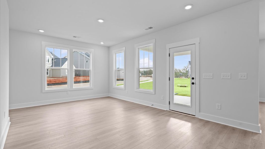 Tasteful dining area with current design in this vibrant two-story townhome