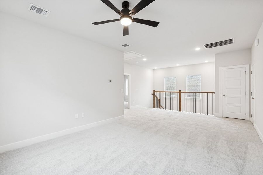 Representative unfurnished interior of a home built from the The Marshall by David Weekley Homes in South Brook, Leander (Image 8).