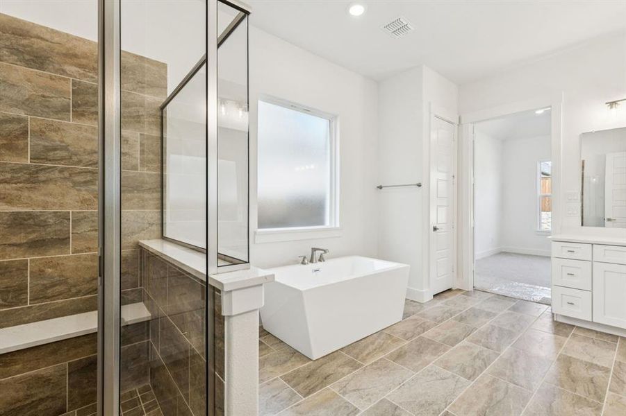 Whether is soaking your cares away or taking a long luxurious shower, this owner's bath is the perfect place to start or end your day.