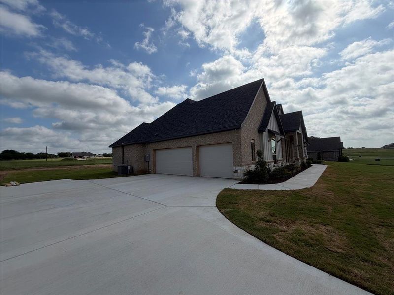 Front exterior of a new home in , Decatur, TX, highlighting curb appeal (Image 19).
