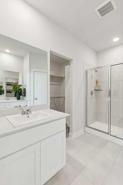 Primary Bathroom in a Nicholson Ranch Magnolia Model Home in Lavon TX by Trophy Signature Homes