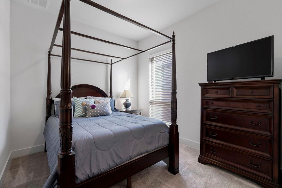 Furnished interior view inside a new home in The Colony 60', Bastrop (Image 14).