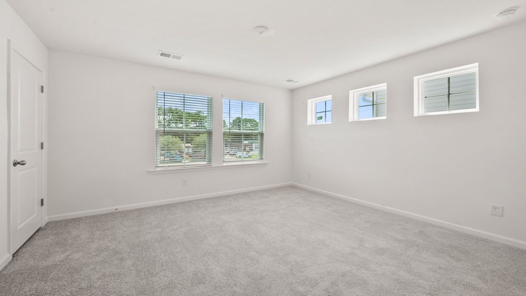 Bedroom with lots of natural light Hayden Floorplan at Clear Springs Townhomes