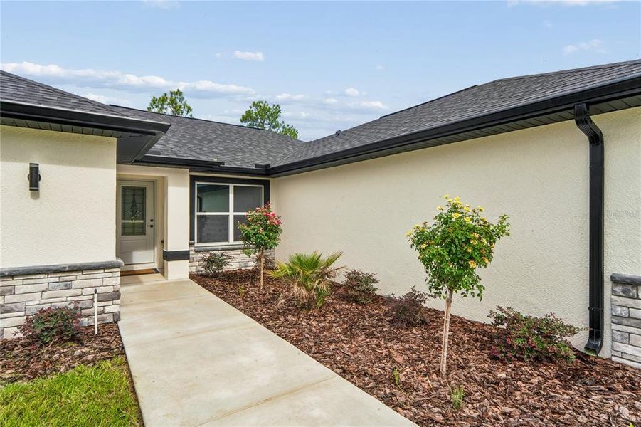 Exterior details and patio area of a home in , Brooksville (Image 33).