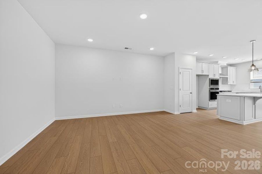 Spacious, unfurnished interior of a new home in North Creek Village - Townhomes, Huntersville (Image 9).