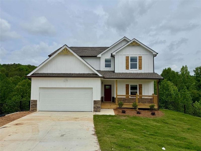 Front exterior of a new home in , Lula, GA, highlighting curb appeal (Image 1).
