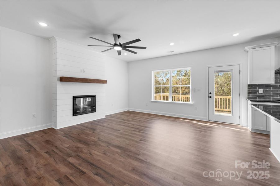 living room w/ electric shiplap fireplace living room w/ electric shiplap fireplace