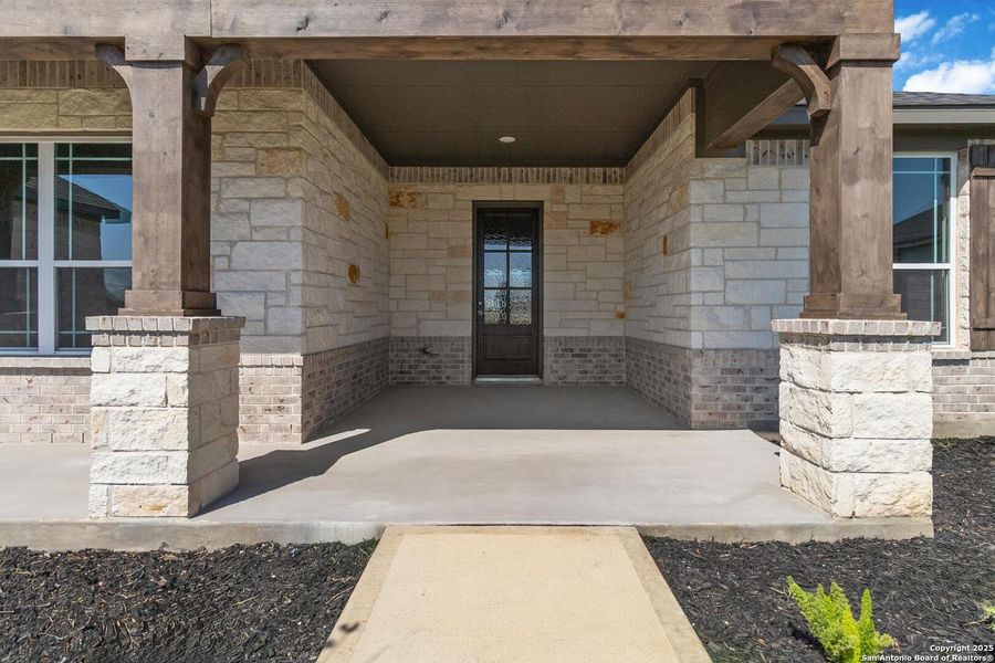 Front exterior of a new home in Bonita Vista, Pleasanton, TX, highlighting curb appeal (Image 18).