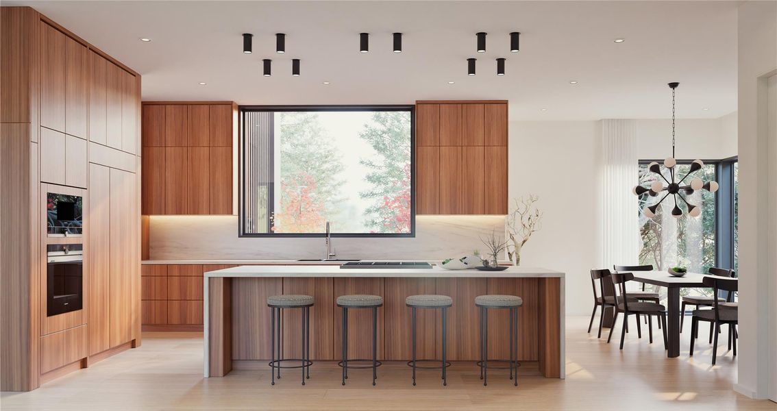 Kitchen featuring modern cabinets, a kitchen breakfast bar, light stone countertops, tasteful backsplash, and light wood finished floors