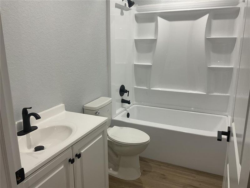 Furnished interior view inside a new home in , Okeechobee (Image 9).