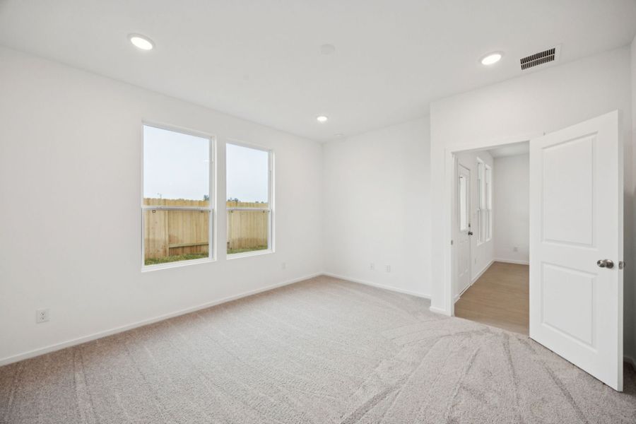 Representative unfurnished interior of a home built from the Beeville by Pulte Homes in Saddleback at Santa Rita Ranch, Liberty Hill (Image 13).