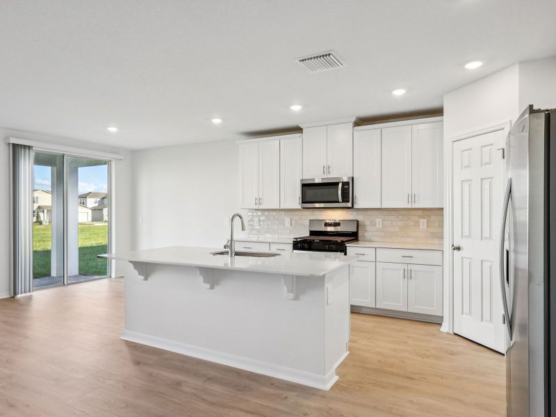 Furnished interior view inside a new home in The Reserve at Hammock Oaks - Signature Series, Lady Lake (Image 4).