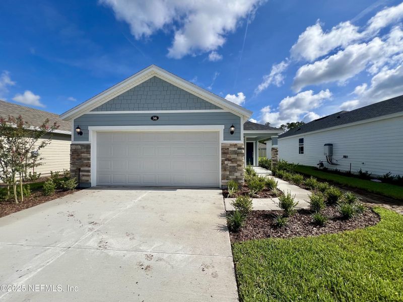 Front exterior of a home in the Stonecrest community, located in St. Johns, FL (Image 14).