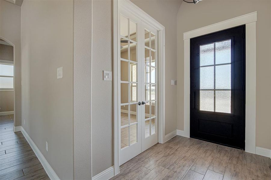 Doorway featuring french doors