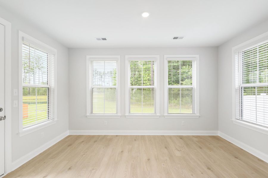 Spacious, unfurnished interior of a new home in Tidewater at Lakes of Cane Bay, Summerville (Image 49).