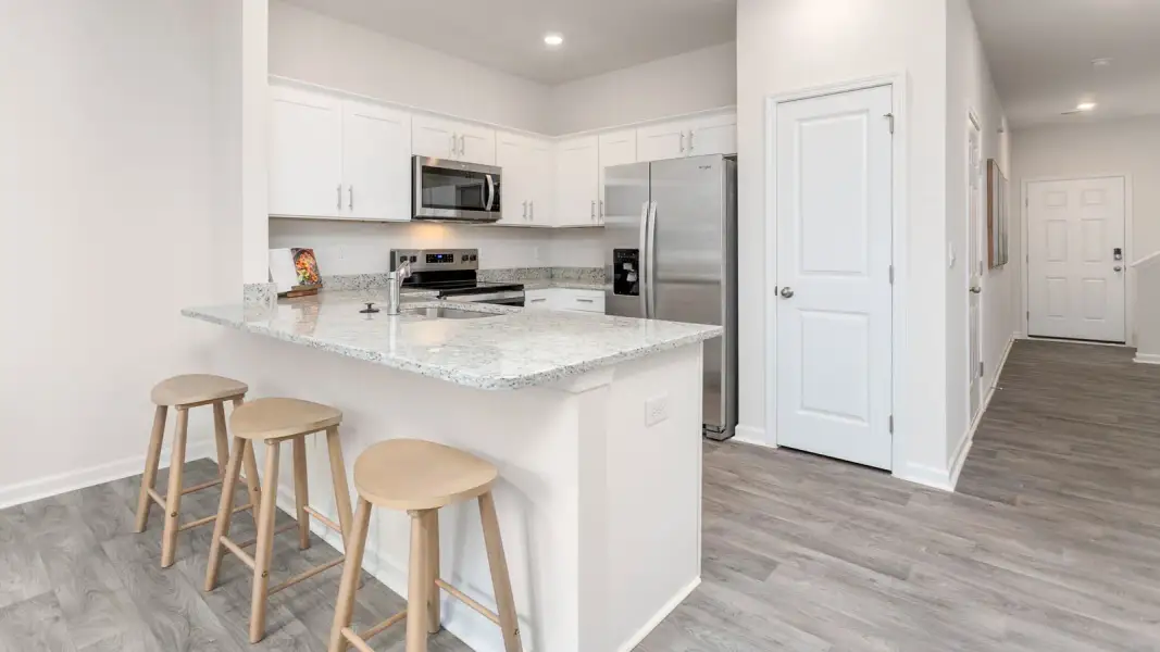 Furnished interior view inside a new home in North Village Townes, Greensboro (Image 5).