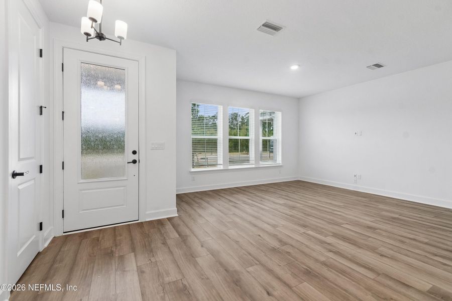 Spacious, unfurnished interior of a new home in Westerly Park at Wildlight - Courtyard Collection, Yulee (Image 20).