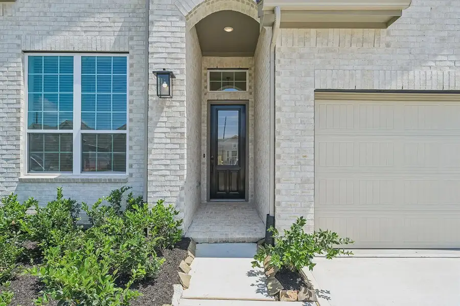Exterior details and patio area of a home in Wood Leaf Reserve, Tomball (Image 3). Exterior details and patio area of a home in Wood Leaf Reserve, Tomball (Image 3).