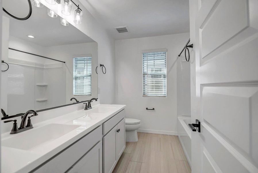 Furnished interior view inside a new home in Ironwood Villages at North Creek, Queen Creek (Image 26).