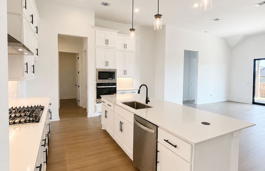 Furnished interior view inside a new home in 6 Creeks, Kyle (Image 14).