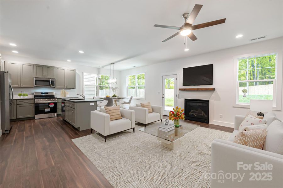 Main level living area - virtually staged Main level living area - virtually staged