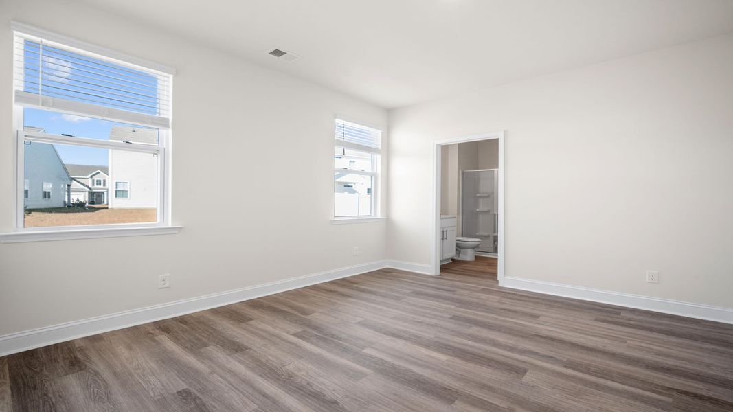 Spacious, unfurnished interior of a new home in The Groves at Bees Creek, Ridgeland (Image 19).