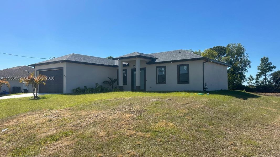 Exterior details and patio area of a home in , Lehigh Acres (Image 3).