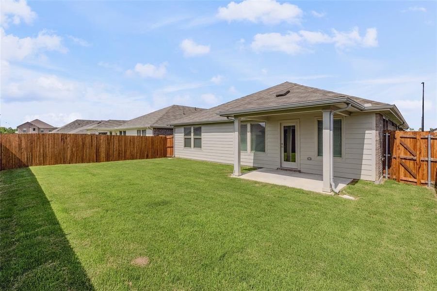 Front exterior of a new home in Stratton Place, Greenville, TX, highlighting curb appeal (Image 18).