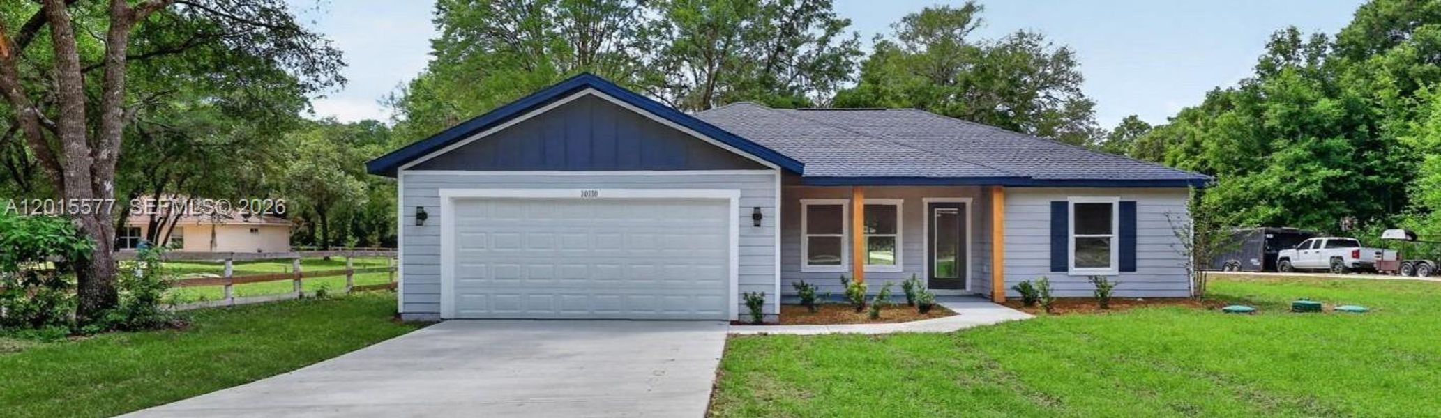 Front exterior of a new home in , Dunnellon, FL, highlighting curb appeal (Image 17).
