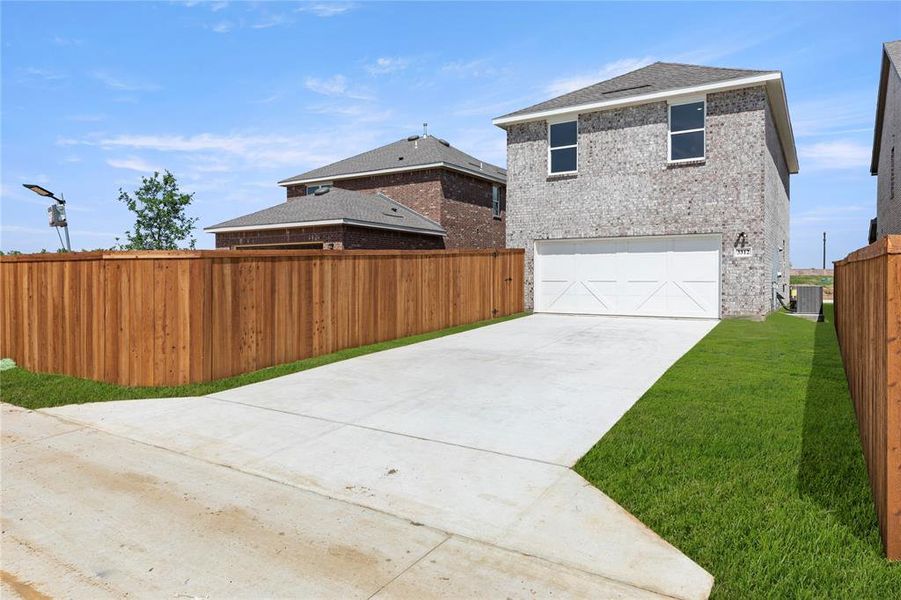 Front exterior of a new home in Brookshire at Legacy Hills, Celina, TX, highlighting curb appeal (Image 25). Front exterior of a new home in Brookshire at Legacy Hills, Celina, TX, highlighting curb appeal (Image 25).
