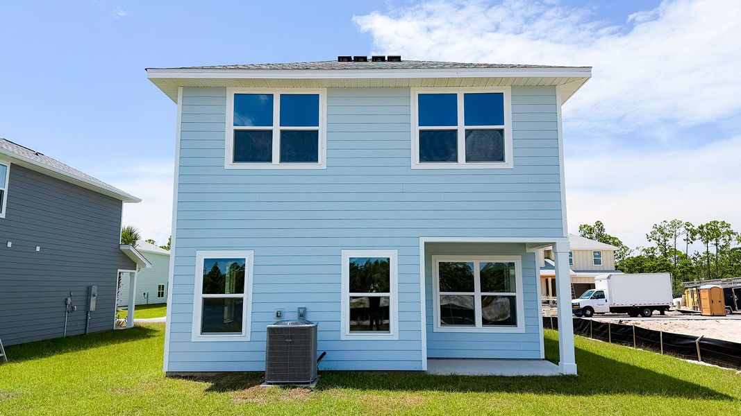 Exterior details and patio area of a home in WindMark Beach, Port Saint Joe (Image 24).